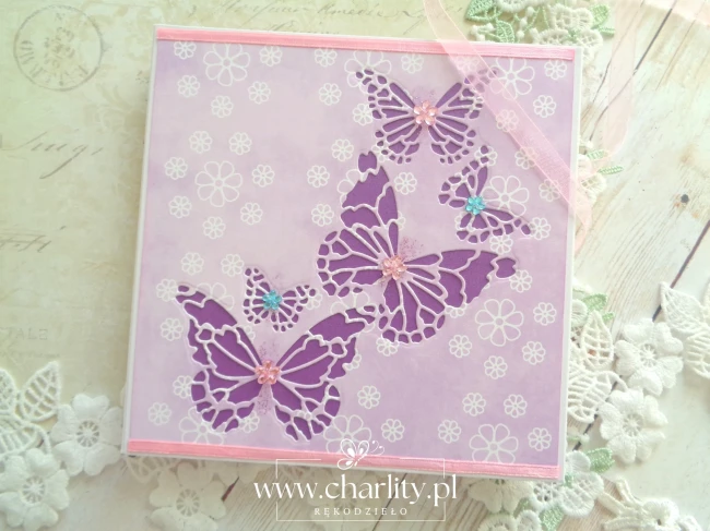 Motylki wycięte w papierze z tyłu albumu handmade
